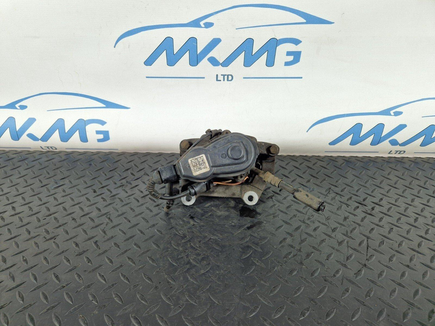 10-17 AUDI A8 4H REAR LEFT N/S BRAKE CALIPER HOUSING & MOTOR UNIT 4H0615403