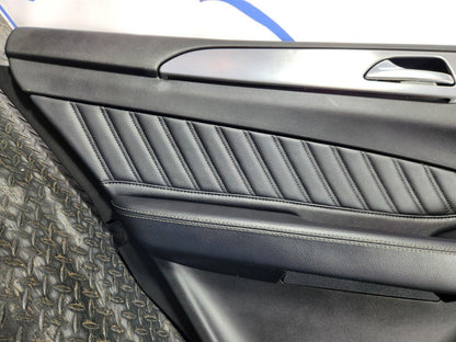 11-19 MERCEDES BENZ ML W166 REAR LEFT N/S/R BLACK LEATHER DOOR CARD PANEL