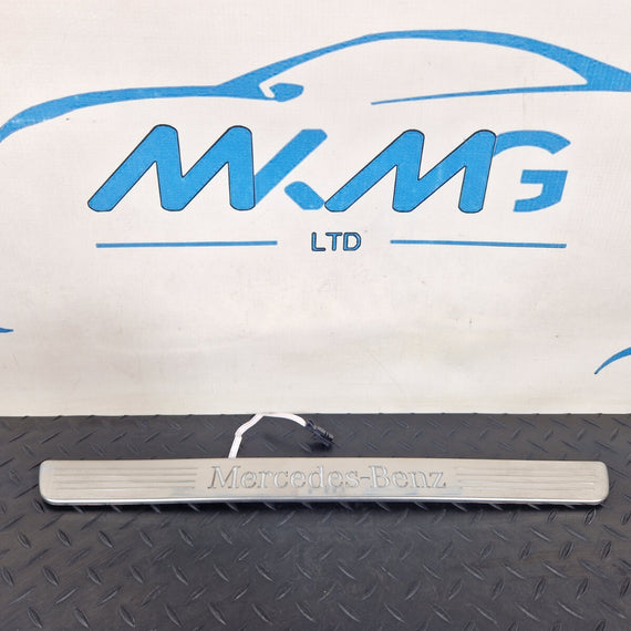 14-20 MERCEDES BENZ GLA X156 OEM FRONT LEFT N/S ILLUMINATED DOOR SILL PANEL TRIM