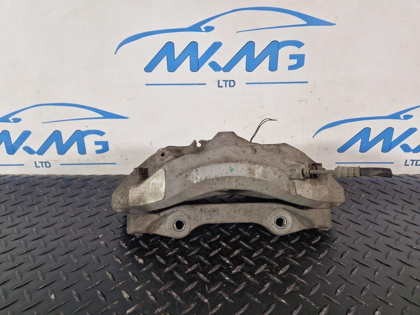16-20 AUDI Q7 4M GENUINE FRONT LEFT N/S COMPLETE BRAKE CALIPER 4M0615105