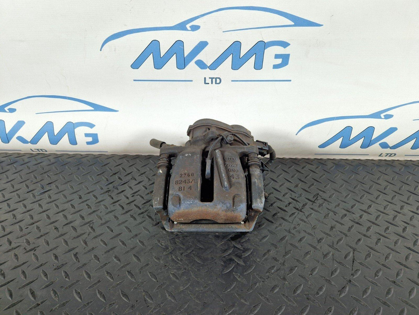 10-17 AUDI A8 4H REAR LEFT N/S BRAKE CALIPER HOUSING & MOTOR UNIT 4H0615403
