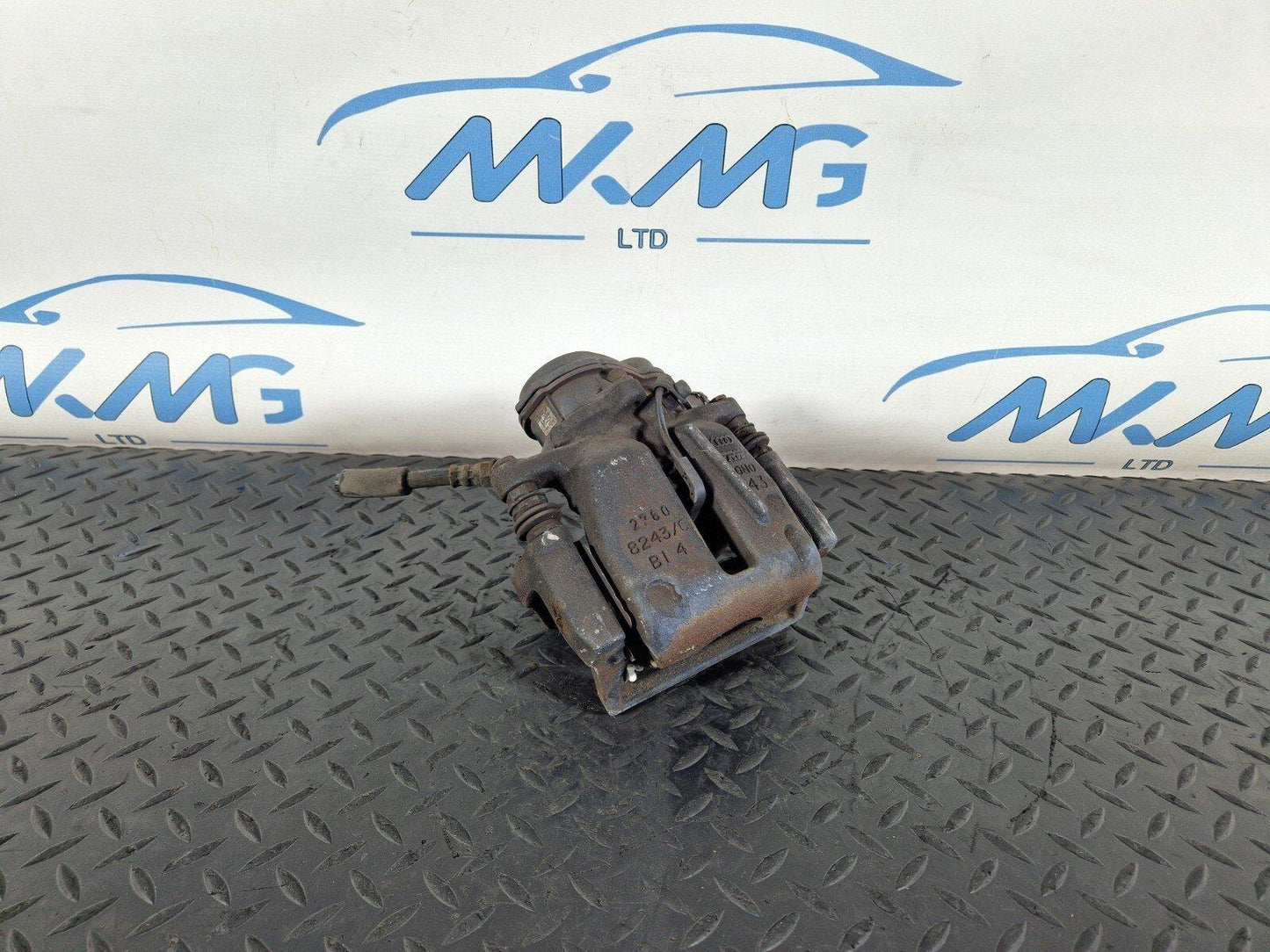10-17 AUDI A8 4H REAR LEFT N/S BRAKE CALIPER HOUSING & MOTOR UNIT 4H0615403