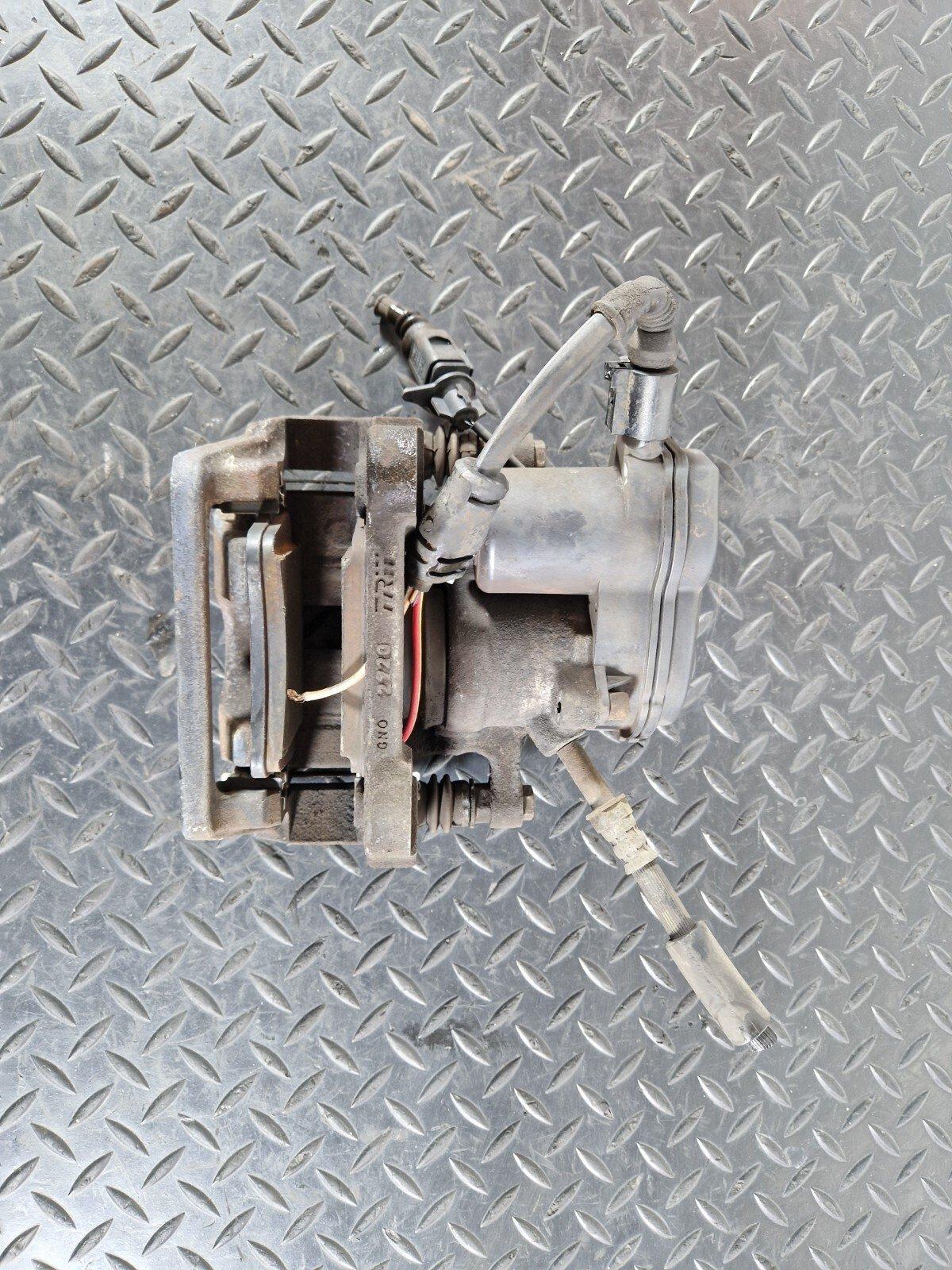 10-17 AUDI A8 4H REAR LEFT N/S BRAKE CALIPER HOUSING & MOTOR UNIT 4H0615403
