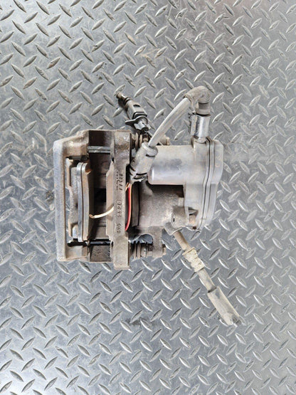 10-17 AUDI A8 4H REAR LEFT N/S BRAKE CALIPER HOUSING & MOTOR UNIT 4H0615403