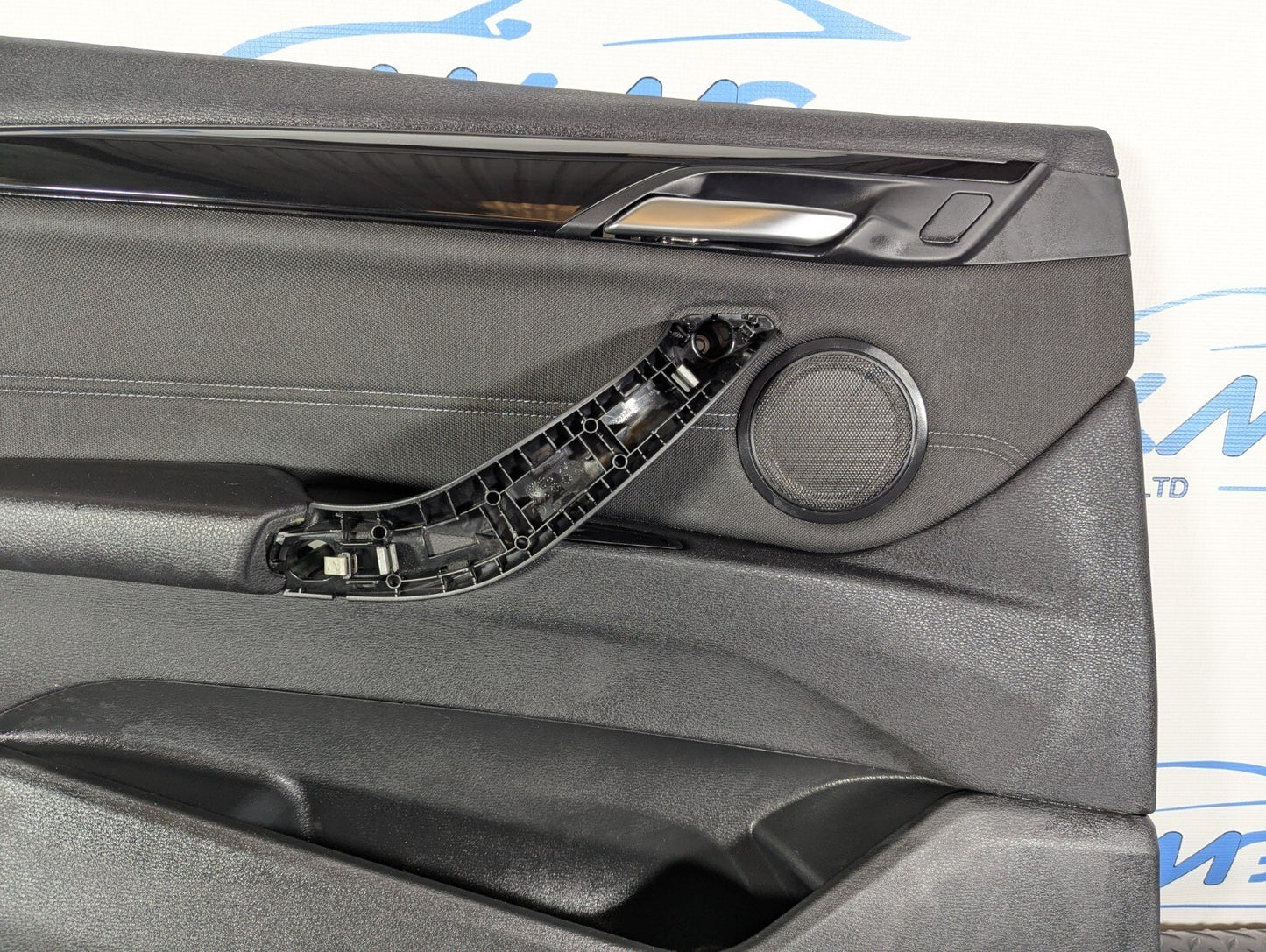 16-22 BMW X1 F48 FRONT PASSENGER SIDE DOOR CARD PANEL IN BLACK
